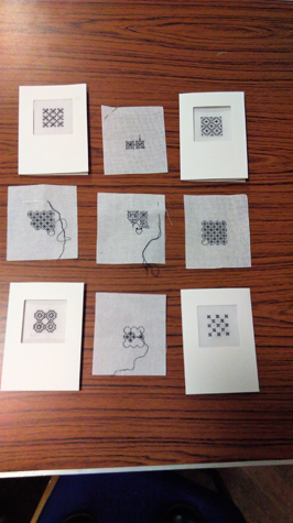 Selection of cards showing black work stitching